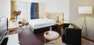 Enjoy spacious rooms with elegant decor and comfortable queen- or king-size beds.