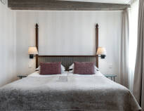 Die eleganten Hotelzimmer geben Ihnen für Ihren Aufenthalt einen komfortablen Ausgangspunkt.