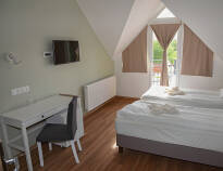 Rooms are bright, friendly and comfortably furnished.