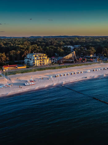 Stay at Ostseeperle Glowe just steps from the sandy Baltic Sea.