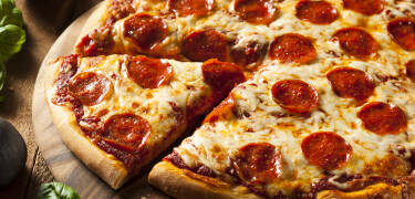 Hotelpakken omfatter en lækker pizza.