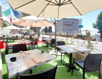 On the hotel terrace you can enjoy delicacies from the hotel kitchen and bar.