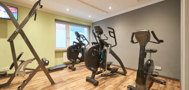Du kan fullføre treningsøktene dine i treningsrommet - hvis du ønsker det, også med en privat trener (mot et gebyr).
