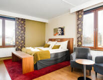 The hotel's cosy rooms are decorated in bright colours and full of charm.